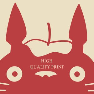 May include: A red illustration of a cartoon character with large ears and eyes, set against a cream background. The text "HIGH QUALITY PRINT" is centered below the character's face.