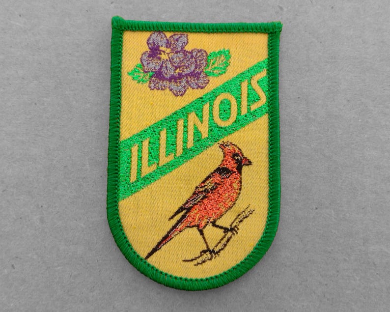 Used vintage Illinois woven patch with violet flowers and cardinal