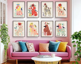 May include: Eight framed art prints featuring colorful poodle illustrations adorned with flowers and birds. The poodles are depicted in various colors, including pink, red, and beige, set against a neutral background. The artwork is displayed above a pink sofa.