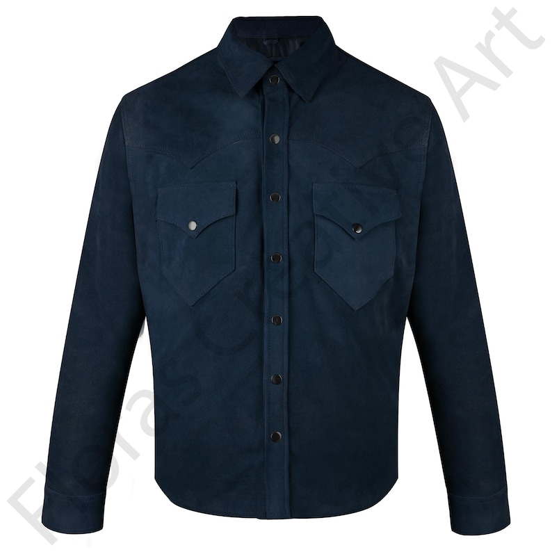 Men’s navy suede shirt jacket with snap button pockets and long sleeves. Featuring a classic western style with a button-down front, this slim fit outerwear is perfect for fall and winter. Designed with a timeless rugged appeal, the jacket combines comfort and style, ideal for casual or semi-formal occasions. The soft suede material and rich navy color make it a versatile piece for layering and staying stylish during colder months.