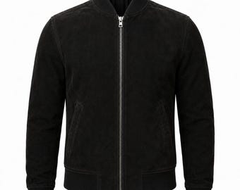 May include: A solid black suede bomber jacket featuring a ribbed collar, ribbed cuffs, and a ribbed hem. The jacket includes a central silver-toned metal zipper closure that extends from the hem to the top of the collar, along with two side pockets.