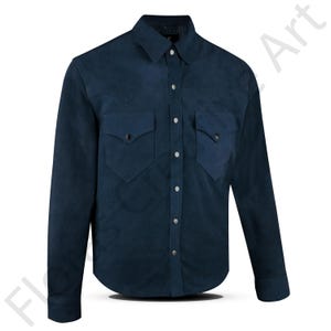 May include: A navy blue suede shirt with a classic Western design. It features two chest pockets with pointed flaps, a button-down front, and long sleeves. The shirt has a collared neckline and a tailored fit.
