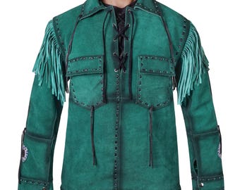 May include: A green suede jacket with fringe detailing on the shoulders. The jacket features a lace-up front, two chest pockets, and decorative stitching. The sleeves have buttoned cuffs and decorative patches.