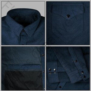 May include: Close-up shots of a navy blue shirt. The shirt features a classic collar, a chest pocket with a button closure, and buttoned cuffs. The fabric appears to be a suede-like material. The shirt has a tailored fit.