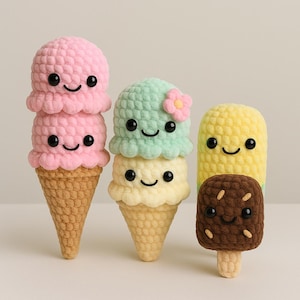 May include: A collection of handmade crochet ice cream cones and popsicles. The ice cream cones feature pink, mint green, and yellow scoops with smiling faces, atop brown cones. A popsicle with a yellow top and chocolate bottom is also shown.