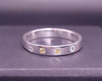 Minimalist Sterling Silver Stacking Ring: Asymmetrical Cubic Zirconia Band