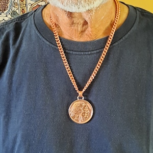A model wearing the copper necklace - you can see how this hangs around your neck and have an idea of the length.