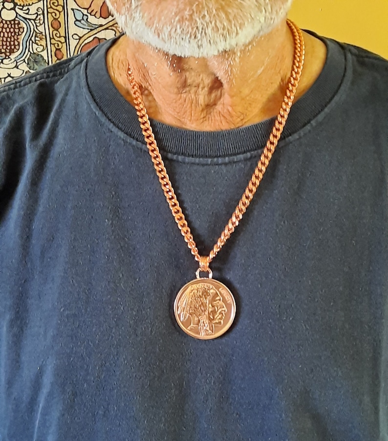 A model wearing the copper necklace - you can see how this hangs around your neck and have an idea of the length.