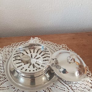 Vintage butter or caviar serving dish, English coquillor style butter dish, covered English butter dish and refined table, old vintage table