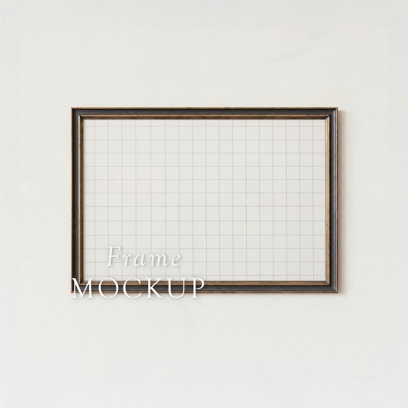 May include: A rectangular frame with a dark brown border and a grid pattern inside. The text "Frame MOCKUP" is displayed in white letters at the bottom of the frame. The frame is set against a white background.