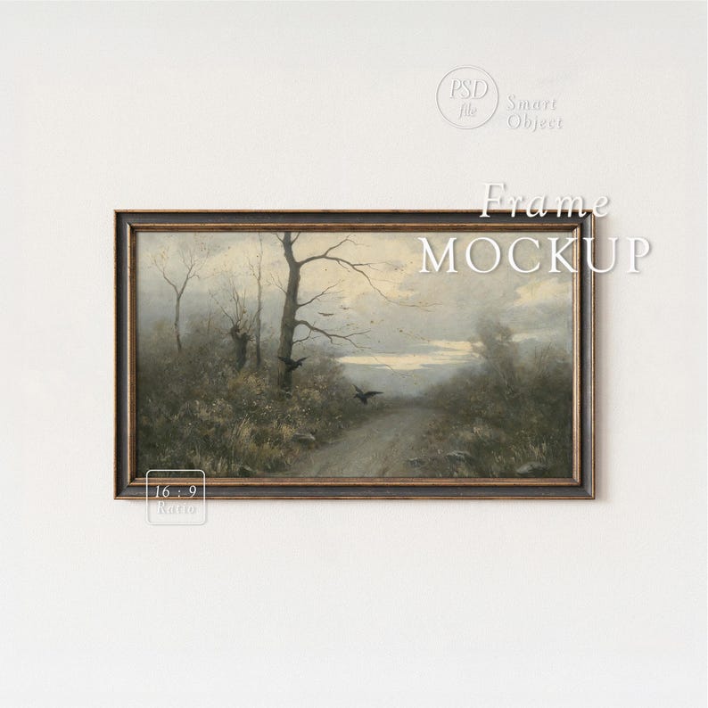 May include: A framed landscape painting with a dark wooden frame. The artwork depicts a path leading through a misty, wooded area with bare trees and flying birds. The text "Frame Mockup" is overlaid on the image.