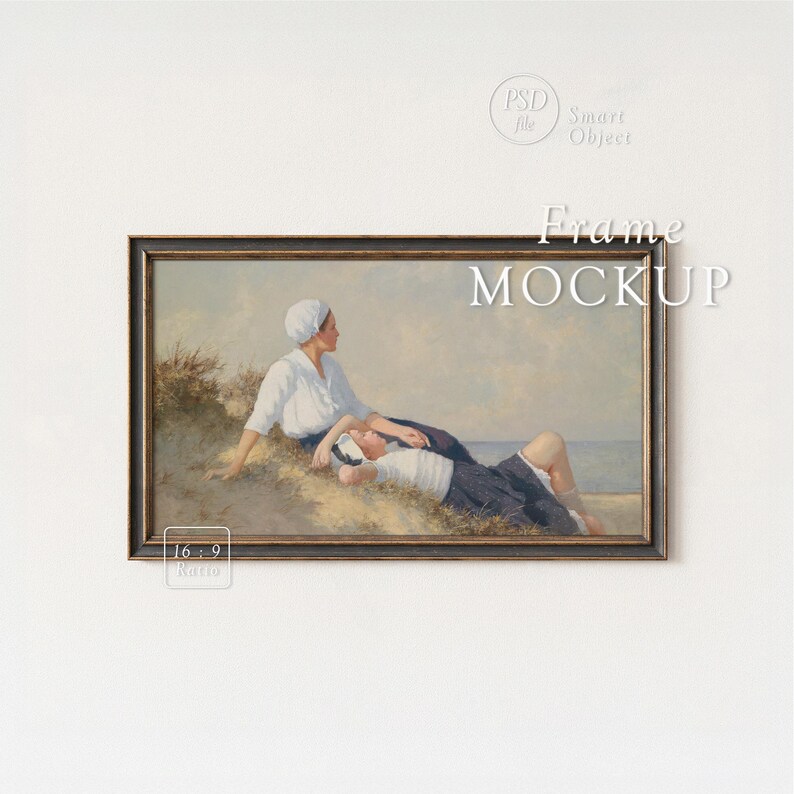 May include: A framed art print featuring a vintage painting of two people on a beach. The artwork is in a dark wooden frame. The words "Frame MOCKUP" are displayed on the image. The aspect ratio is 16:9.