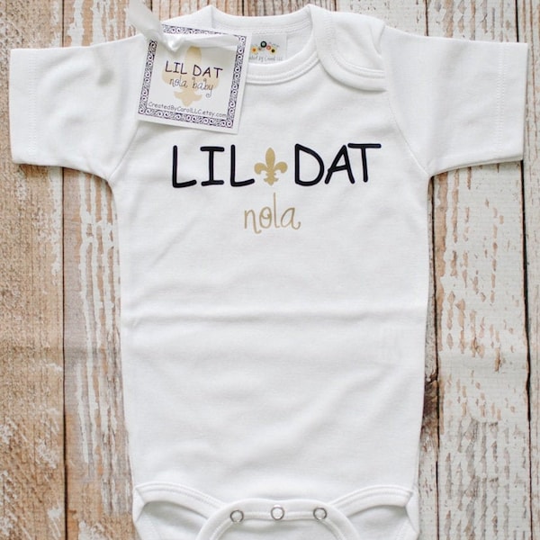 Lil Dat Black and Gold NOLA Baby:  Onesie, T-Shirt, Gown Bib or Blanket (you pick)