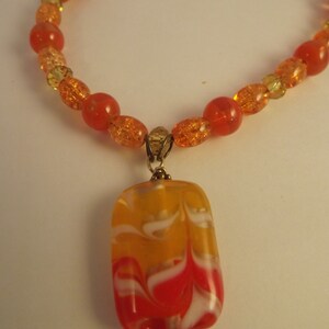 Orange Wave Pendant Necklace