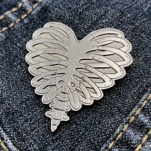 Heart Shaped Ribcage Enamel Pin