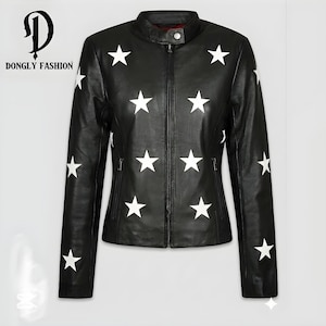 May include: Black leather jacket with white star pattern. Features a stand-up collar, zip-up front, and side pockets. The jacket has long sleeves and the text "DONGLY FASHION" on the upper left side.