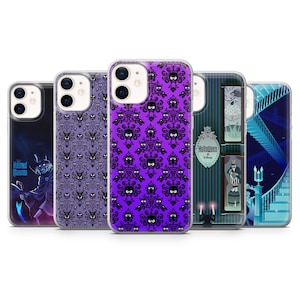 May include: A selection of phone cases with different designs. The cases display a purple damask pattern, a Haunted Mansion theme, and other graphics. The cases are designed to fit various phone models.