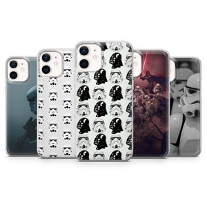 May include: A collection of phone cases featuring Star Wars characters and designs. The cases display images of Darth Vader, Stormtroopers, and other iconic elements from the Star Wars franchise. The cases are in various colors, including black, white, and gray.