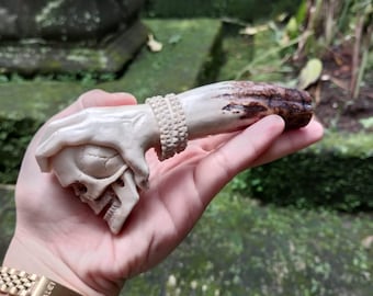 antler carving made for knife handle or walking stick handle skull motive