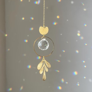 atrapasol, feng shui, decoración boho, arcoíris, prisma, espiritualidad, bienestar, hoja, botánica