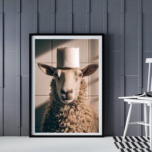 May include: A white sheep with a toilet paper roll on its head. The sheep is looking directly at the camera. The background is a white tiled wall.