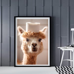 May include: A brown alpaca wearing a white toilet paper roll as a hat. The alpaca is looking directly at the camera.