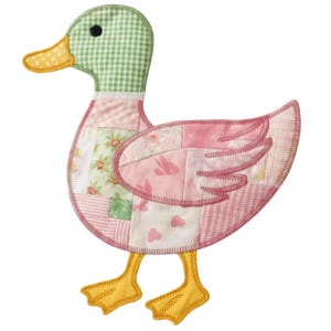 May include: A quilted duck applique in pastel pinks, greens, and yellows. The duck features a green and white checkered head, a yellow beak with polka dots, and a pink body with floral and heart patterns. The applique is stitched with a dark pink thread.