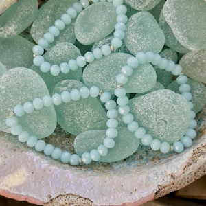 faceted rondelle pale blue glass bead elastic bracelet