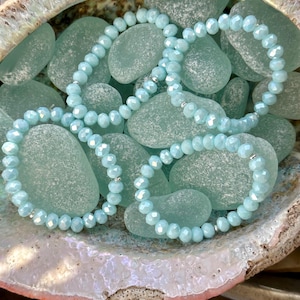 faceted rondelle sparkly aqua glass bead elastic bracelet