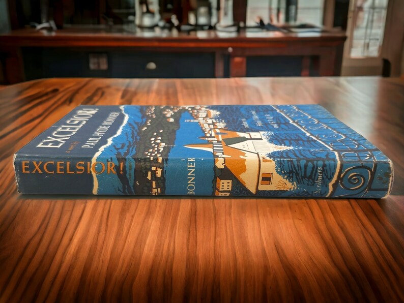 Book spine and cover laid flat – Displays title "Excelsior!" and author "Bonner" along spine with matching dust jacket design.