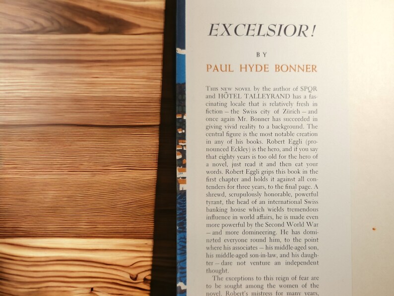 Dust jacket inner flap – Descriptive blurb highlighting plot centered around Swiss banker Robert Eggli and WWII backdrop.