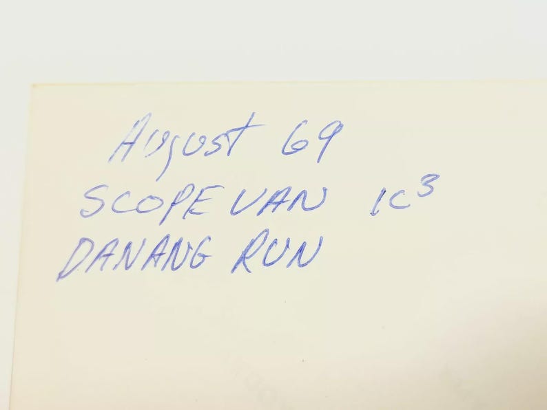 May include: A handwritten note on a white background with the text "August 69 Scope Van 1C3 Danang Run".