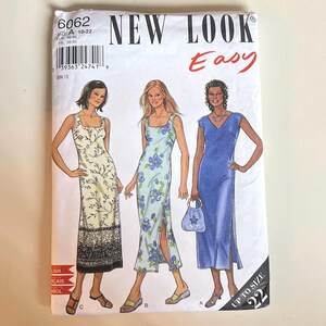 May include: A New Look Easy sewing pattern featuring three dress designs. The pattern includes sizes 10-22. The cover displays illustrations of the dresses, with floral and solid color options. The pattern number is 6062.