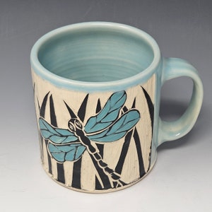 Handcrafted Sgraffito Dragonfly Mug with Blue and Green Wings -  Light Blue Glaze