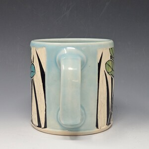 Handcrafted Sgraffito Dragonfly Mug with Blue and Green Wings -  Light Blue Glaze