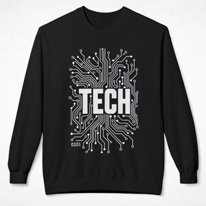 May include: A black long-sleeve sweatshirt featuring a white graphic print of a circuit board pattern surrounding the word TECH in large capital letters, with the binary numbers 0101 printed in a smaller font size near the bottom left corner.