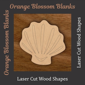 May include: A laser-cut wood seashell shape with etched lines, set against a dark brown background. The text "Orange Blossom Blanks" and "Laser Cut Wood Shapes" are displayed around the seashell. The seashell is a light tan color.