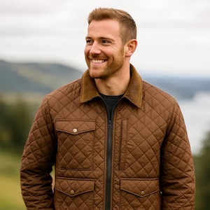 May include: A brown quilted jacket with a corduroy collar and a front zipper. The jacket has two chest pockets and two lower pockets. The jacket is worn over a dark shirt.