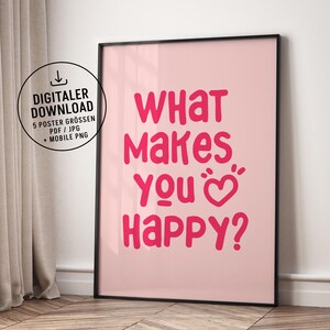 Könnte beinhalten: Gerahmtes rosa Poster mit dem Text "What Makes You Happy?" in leuchtendem Pink. Das Poster enthält auch ein digitales Download-Symbol und Text. Der Rahmen ist schwarz.