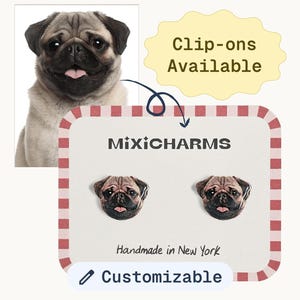 May include: A pair of pug-faced stud earrings on a card with the text "MixiCHARMS" and "Handmade in New York". The earrings are brown and black, with a pug image. The card has a red and white border. The text "Clip-ons Available" is also present.