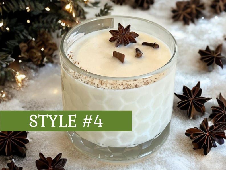 May include: A clear glass candle with a textured honeycomb pattern filled with off-white wax. The top features a wooden wick, a star anise, and two cloves. A green rectangular overlay with the white text STYLE #4 is positioned across the lower section of the glass.