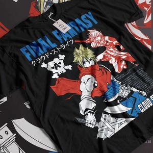 May include: Black t-shirt featuring a graphic design from Final Fantasy. The design includes the text "FINAL FANTASY" in blue, Japanese text, and character illustrations in red, white, and blue. A white skull graphic is also present.