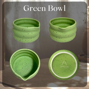 May include: Four views of a green ceramic bowl with a speckled design. The bowl has a unique shape with a spout and a ridged exterior. The text "Green Bowl" is at the top of the image. The bottom of the bowl has the text "Artolia Studio".