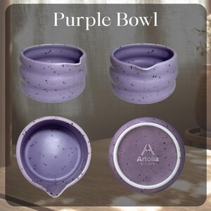 May include: Four views of a purple bowl with a spout, speckled with dark flecks. The bowl has a ribbed design and the text "Purple Bowl" is at the top. The bottom of the bowl has the text "Artolia Studio".