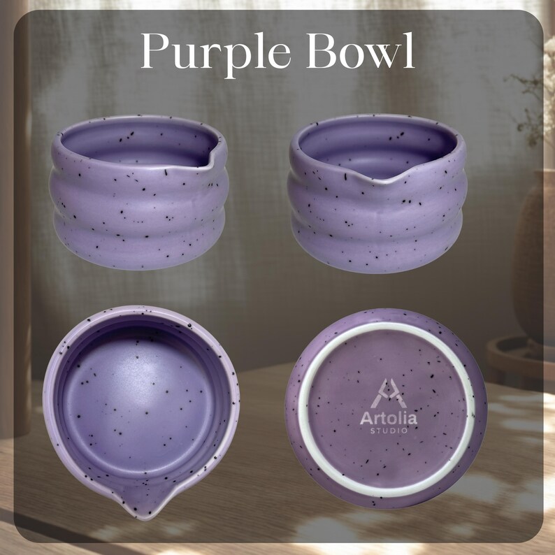 May include: Four views of a purple bowl with a spout, speckled with dark flecks. The bowl has a ribbed design and the text "Purple Bowl" is at the top. The bottom of the bowl has the text "Artolia Studio".