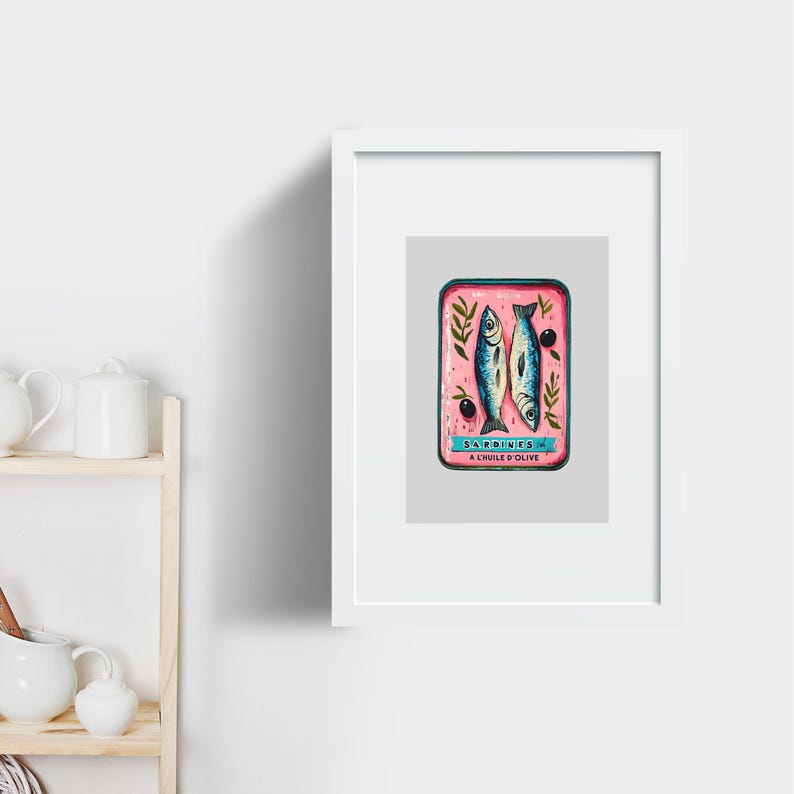 May include: A vintage-style illustration of a pink can of sardines in oil. The can has a blue label with the text "SARDINES A L'HUILE D'OLIVE" and features two sardines and a black olive.
