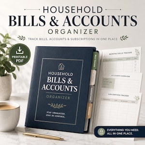 May include: A navy blue "Household Bills & Accounts Organizer" with a gold pen and a cup of coffee. The organizer includes sections for bills, accounts, subscriptions, and expenses. The text reads "Stay Organized. Stay in Control."