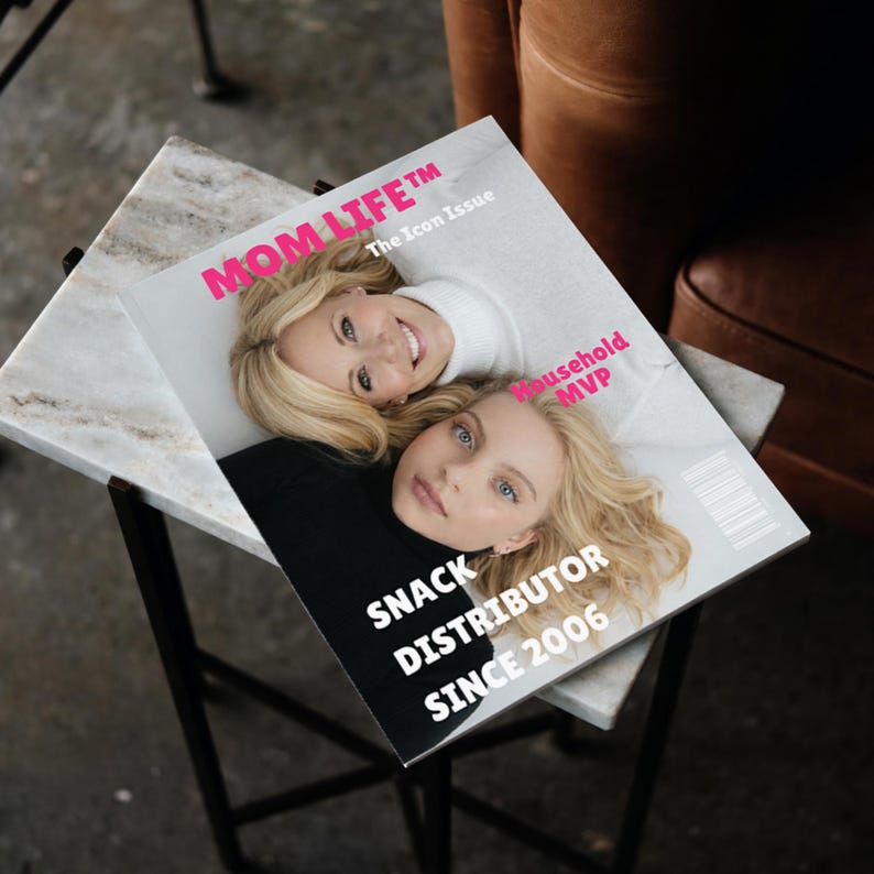 May include: A magazine titled MOM LIFE The Icon Issue featuring a photograph of two blonde individuals. The cover includes the text Household MVP and SNACK DISTRIBUTOR SINCE 2006. One individual wears a white turtleneck, the other a black turtleneck.