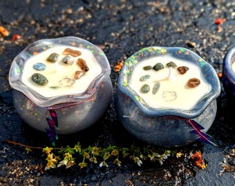 Thunderstorm Candle:  Petrichor, rainwater, fern, and flower scented hand poured in a handmade resin cauldron adorn with crystals and charms
