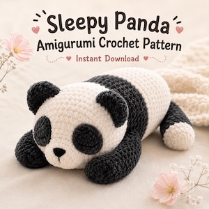 May include: A handmade amigurumi crochet panda in black and white, lying down. The panda has black ears, eyes, and limbs, with a white body. The text "Sleepy Panda" and "Amigurumi Crochet Pattern" are displayed above the panda.